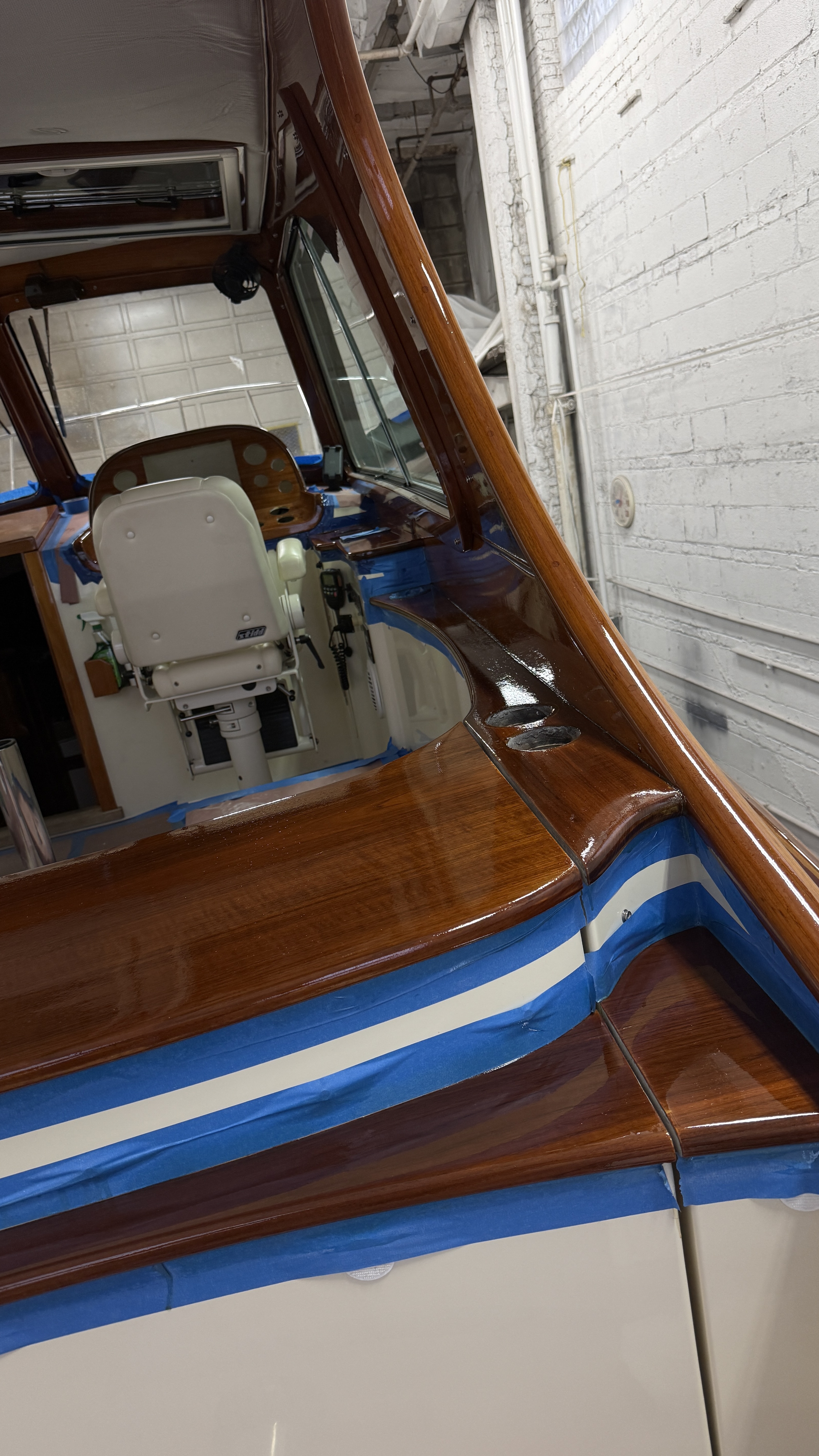 Freshly varnished cockpit brightwork