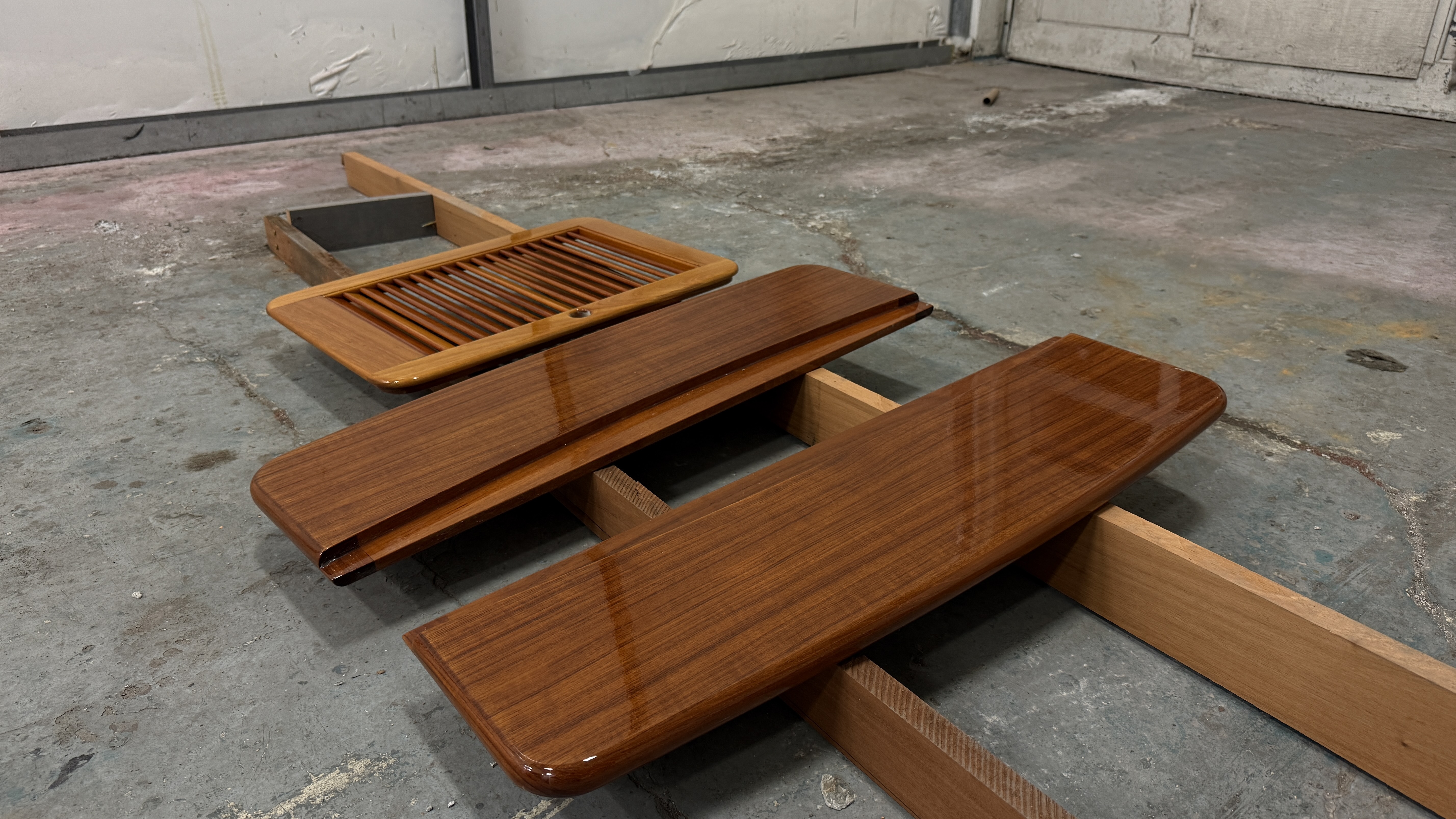 Varnished teak planks drying